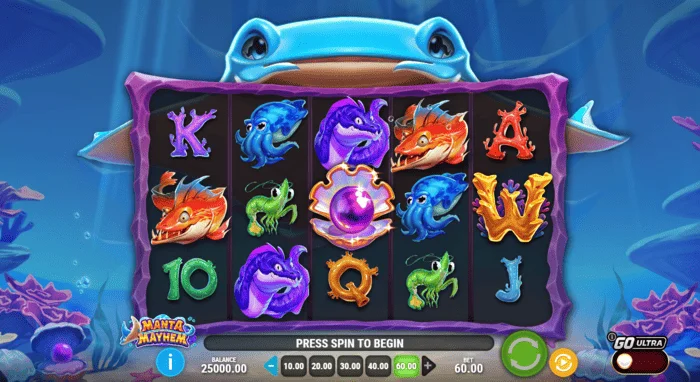 Manta Mayhem - หน้าจอเกมที่มีวงล้อและปลากระเบนแมนต้า